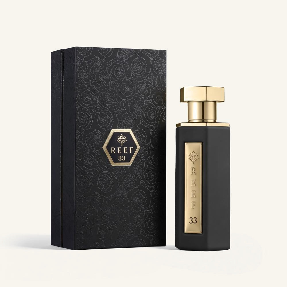 REEF 33 bottle beside presentation box